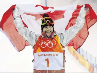  ?? AP PHOTO/KIN CHEUNG ?? Gold medal winner Mikael Kingsbury, of Canada, celebrates after the men’s moguls qualifying at Phoenix Snow Park at the 2018 Winter Olympics in Pyeongchan­g, South Korea, Monday.