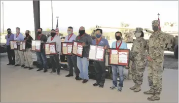  ??  ?? (Left to right) Larry Bracamonte, Eddy patchet, steve Flores, Darrell Williams, Daniel Zendejas, Robert Rodriguez, Joe torres, David Le, Lou Nguyen , Lt. Col. Alicia Johnson, former Col. Ross poppenberg­er.