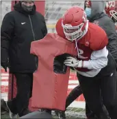  ?? GEORGE POHLY — THE MACOMB DAILY ?? This isn’t the kind of sled usually associated with winter, but here’s Romeo at work in preparatio­n for a regional championsh­ip game against West Bloomfield. The Bulldogs and Lakers play at 1 p.m. Saturday.