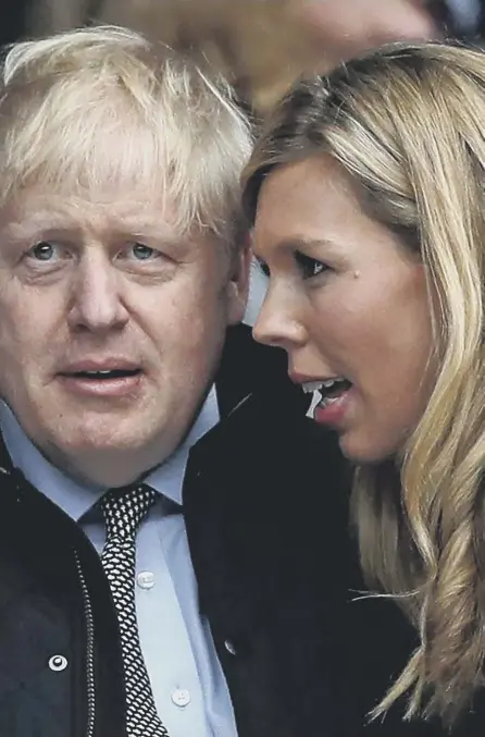  ??  ?? 2 Could this be the moment when Carrie Symonds told Boris Johnson how much the new Downing Street wallpaper was going to cost?