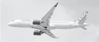  ??  ?? The Bombardier CS300 performs a demonstrat­ion flight at the Paris Air Show.