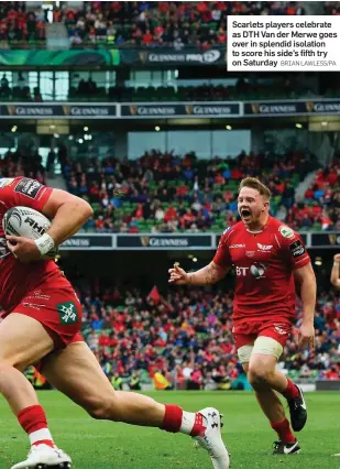  ?? BRIAN LAWLESS/PA ?? Scarlets players celebrate as DTH Van der Merwe goes over in splendid isolation to score his side’s fifth try on Saturday