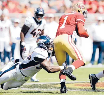  ?? EZRA SHAW/GETTY ?? 49ers QB Josh Johnson runs with the ball against the Broncos during a preseason game in 2014.