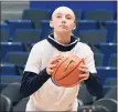  ?? Jessica Hill / Associated Press ?? Off crutches, UConn’s Paige Bueckers shoots before the Huskies’ game against Xavier on Saturday in Hartford.