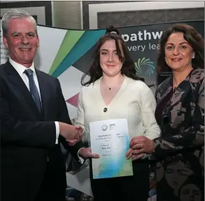  ??  ?? Denis Leamy, CE Cork ETB presents Sarah Twomey, Bishop McEgan College, with her Student of the Year Award, with school principal Trish Lynam.