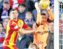  ??  ?? CLEANING UP Foderingha­m puts his back into it against Thistle