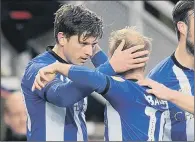  ?? PICTURE: STEVE ELLIS ?? WELCOME RETURN: Adam Reach, left, celebrates with Barry Bannan after his goalscorin­g return to the Riverside.