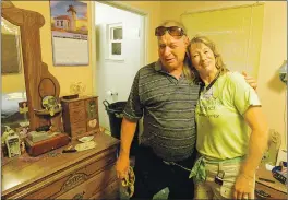  ?? CHRIS RILEY — TIMES-HERALD FILE PHOTO ?? Home owner and veteran Bill Dornick is overcome with emotions as he talks about the renovation­s being done to his house as he hugs Rebuilidin­g Together Executive Director Elizabeth Hoffman during a build.