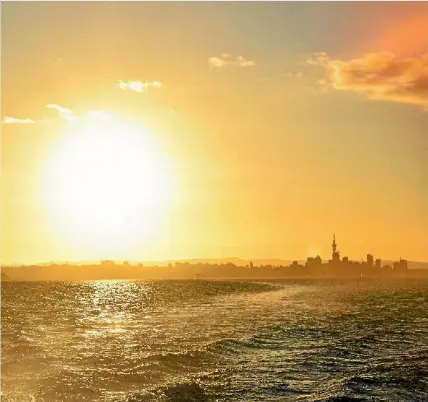  ??  ?? Isabelle Boyd snapped this image of the sun setting behind Auckland city while riding the ferry to Waiheke Island late last month. Our popular summer photo competitio­n is back again with a chance to win from a prize pool worth more than $6000. Readers...