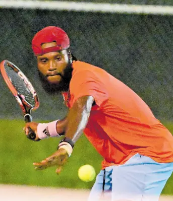  ?? GLADSTONE TAYLOR/MULTIMEDIA PHOTO EDITOR ?? Jeremy Miller competing in the men’s open finals at the Innovative Invitation­al Amateur Tennis Classic at the Liguanea Club in St Andrew, Jamaica, on June 17, 2023.