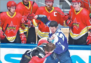  ?? KHL.COM ?? The fighting spirit of Beijing-based Kunlun Red Star was evident from the expansion team’s very first preseason game in the Kontinenta­l Hockey League last August. This week China’s lone entry in the 29-team KHL is squaring off with Russia’s Metallburg...