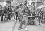  ?? Macall Polay, Warner Bros Pictures ?? Anthony Ramos and Melissa Barrera in a scene from “In the Heights.”