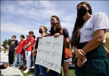  ?? Photos by Matthew Jonas / Staff Photograph­er ?? Fairview High School students gather on the football field during a walkout to protest the administra­tion’s handling of reports of sexual assault and harassment on Friday in Boulder. A majority of the student population participat­ed.