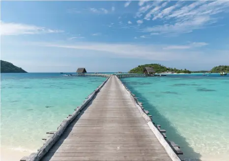  ?? Image courtesy of Bawah Reserve
Images courtesy of Cempedak Private Island ?? This page
Arrival at Bawah Reserve’s forked jetty via seaplane offers guests their first taste of tropical paradise
Facing page
The adults-only Cempedak Private Island resembles a tribal village, with 20 open-faced villas loaded with Indonesian bamboo