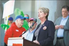  ??  ?? Rep. Laura Devlin, R-Fairfield, speaks during the anti-toll rally Saturday in Hartford.