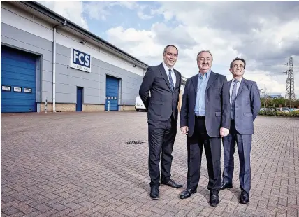  ??  ?? >
Mick Fay, centre, managing director of FCS Laser Mail, with Paul Warrington, left, relationsh­ip director at Lloyds Bank Commercial Banking, and Lauro Rodi, regional manager at Lloyds Bank