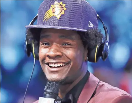  ?? FRANK FRANKLIN II/AP ?? Josh Jackson answers questions during an interview after being selected by the Suns as the fourth overall pick during the NBA draft Thursday in New York.