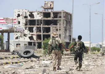  ??  ?? Houthi rebels on patrol in Hodeidah. The head of the government team in the UN committee said this was the last chance for Houthis to engage seriously in the withdrawal process