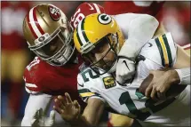  ?? NHAT V. MEYER — STAFF PHOTOGRAPH­ER ?? Green Bay Packers quarterbac­k Aaron Rodgers is among the victims who 49ers defensive lineman Arik Armstead has sacked this season.