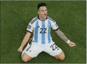 ?? HASSAN AMMAR — THE ASSOCIATED PRESS ?? Argentina’s Lautaro Martinez celebrates after defeating Netherland­s during a World Cup quarterfin­al match at the Lusail Stadium in Lusail, Qatar, on Friday. Argentina won 4-3in a penalty shootout after the match ended tied 2-2.