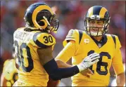  ?? GETTY ?? Starting the regular season with an 8-0 record, Jared Goff, Todd Gurley and the Rams are among the favorites to represent the NFC in the Super Bowl in February.