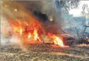  ?? PTI/FILE ?? Vehicles burn after being set on fire by a mob during a protest over alleged cow slaughter in Bulandshah­r on Monday