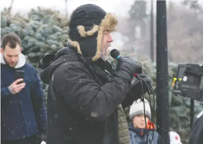  ?? BRANDON HARDER ?? Organizer Mark Friesen speaks to a crowd what was billed as the Saskatchew­an Freedom Rally held at the Saskatchew­an Legislativ­e Building in Regina on Saturday. Friesen says that a further rally in Saskatoon is already in the offing.