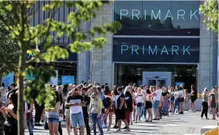  ?? Picture: GETTY ?? VALUED: Queues when Primark at Rushden Lakes, Northants, reopened in June