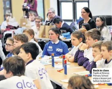  ??  ?? Back in class Pupils at Kinross Primary School enjoy a lesson just before lockdown