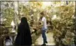  ?? EBRAHIM NOROOZI — THE ASSOCIATED PRESS ?? A woman shops Monday at the old main bazaar in Tehran, Iran.