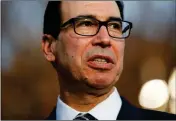  ?? ASSOCIATED PRESS ?? TREASURY SECRETARY STEVE MNUCHIN talks with reporters about trade negotiatio­ns with China, at the White House Monday in Washington.