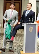  ??  ?? Taoiseach Leo Varadkar and Canadian Prime Minister Justin Trudeau joke about the Taoiseach’s socks