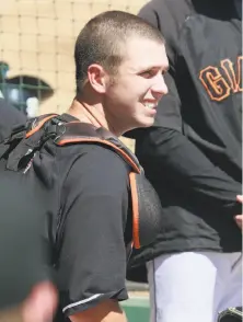  ?? Lea Suzuki / The Chronicle 2009 ?? Posey has come a long way as a catcher since he was playing for the Class A San Jose Giants at the start of the 2009 season.