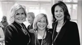  ??  ?? Agents, management, and staff enjoyed pre-luncheon Christmas cheer. Shown are (l to r) Bonnie Laughlin, Heidi Dugan and Linda King.