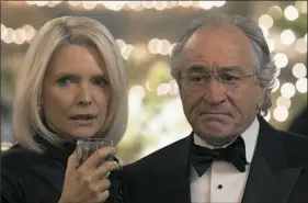 ?? Craig Blankenhor­n/HBO ?? Michelle Pfeiffer reckons with some dark secrets as Bernie Madoff’s wife, Ruth, in “The Wizard of Lies,” starring Robert De Niro.