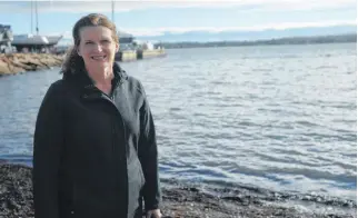  ?? RYAN ROSS • THE GUARDIAN ?? Cheryl Paynter, shown at the site of the annual New Year's Day polar bear dip in Charlottet­own, says the event won't be held in 2021 because of the COVID-19 pandemic.