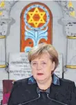  ?? FOTO: AFP ?? Mahnungen in der Berliner Synagoge: Bundeskanz­lerin Angela Merkel am Freitag.