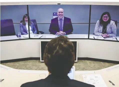  ?? — GOVERNMENT OF CANADA ?? Premier John Horgan meets Prime Minister Justin Trudeau via video conference from Victoria to Vancouver on Monday, after an in-person meeting was cancelled due to weather.