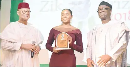  ??  ?? L-R: Pat Utomi; Temi Otedola, who received the Zik Prize for Business Leadership 2018 on behalf of her father, Femi Otedola, and Niyi Adebayo, former governor of Ekiti State, in Lagos.