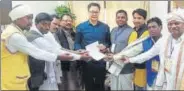  ?? HT PHOTO ?? ■ BJP state president Laxman Gilua with a delegation handing over a memorandum to Union minister of state for Home affairs Kiran Rijiju in New Delhi on Friday.