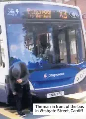  ??  ?? The man in front of the bus in Westgate Street, Cardiff