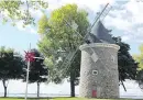  ?? JOHN MAHONEY, MONTREAL GAZETTE FILES. ?? The windmill in Pointe Claire Village is reflected in the city’s logo.