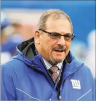  ?? Seth Wenig / Associated Press ?? New York Giants general manager Dave Gettleman will be back for a fourth season. While sick of the losing seasons, co-owner John Mara felt the Giants establishe­d a foundation and culture under rookie coach Joe Judge, giving him optimism the playoffs may not be far away.