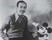  ??  ?? 0 Walt Disney with Mickey Mouse; the Disney Brothers Cartoon Studio opened on this day in 1923
1978: