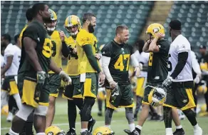  ?? GREG SOUTHAM ?? Members of the Edmonton Eskimos run drills in practice in preparatio­n to face the Calgary Stampeders in exhibition action.