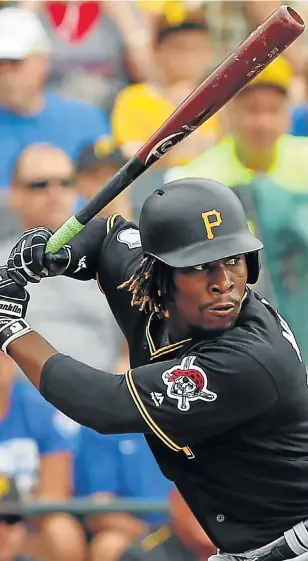  ?? Picture: GETTY IMAGES ?? SWING IT, SON: Pittsburgh Pirates second baseman Gift Ngoepe in action this week