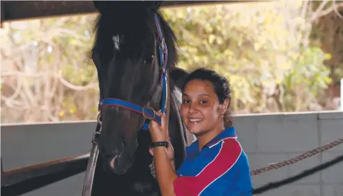  ??  ?? FAMILY PURSUIT: Innisfail trainer Maria Potiris, with horse Short Term, is following in her dad Stephen’s footsteps.
Picture: STEWART McLEAN