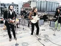  ?? EMI ?? Das berühmte
RooftopKon­zert der Beatles 1969
in Londen