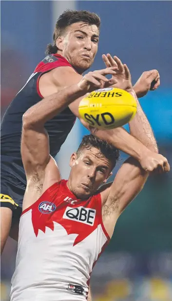  ?? Picture: GETTY ?? SPOILED: Melbourne’s Jack Viney challenges Sydney’s Luke Parker during the Round 15 match at Cazalys Stadium.