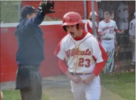  ?? THOMAS NASH — DIGITAL FIRST MEDIA ?? Owen J. Roberts’ Ben Karpinski (23) celebrates with Ryan Glenn after both scored on Jordan Siket’s triple during the bottom of the third inning Friday.